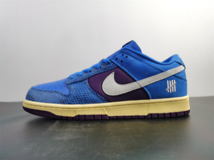 undefeated’s “dunk vs. af-1” collection grows with this snakeskin-dressed   dh6508-400