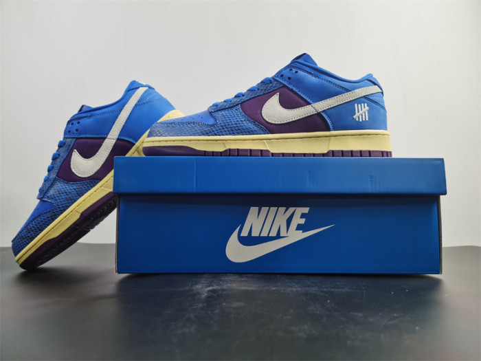undefeated’s “dunk vs. af-1” collection grows with this snakeskin-dressed   dh6508-400